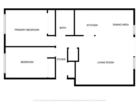 A black and white floor plan of a house with a living room, dining area, kitchen, and several bedrooms.